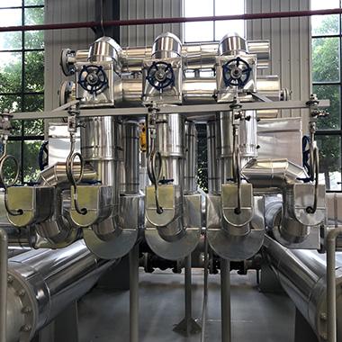 Steam ejector, steam seal insulation layer and hood